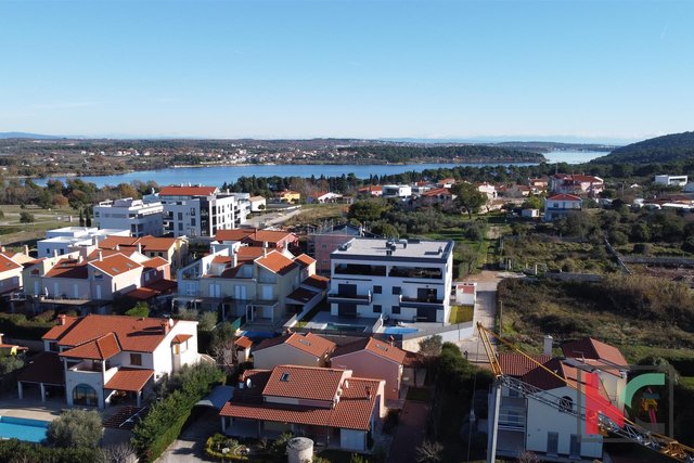 Istria - Premantura - Volme, apartment 77m2 in a luxurious new building with open sea view